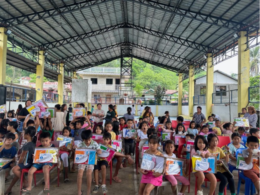 Children with school supplies.